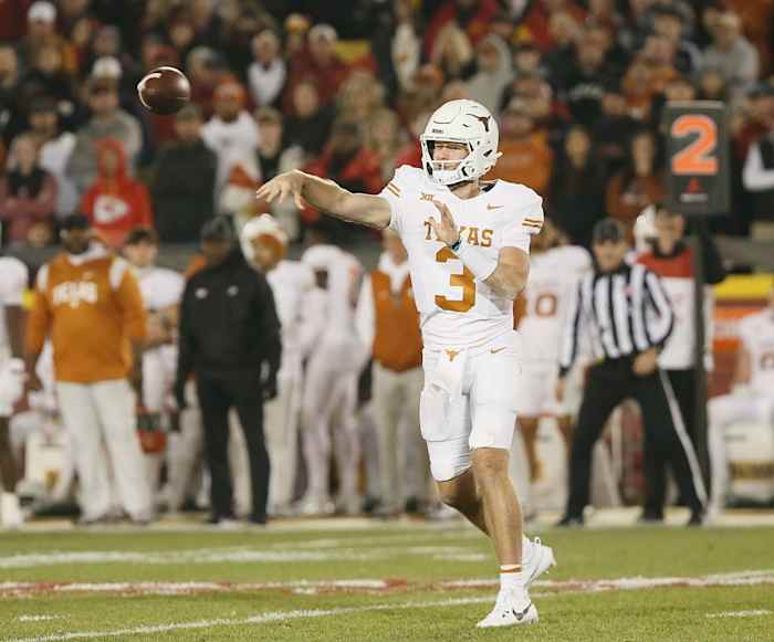 Texas Longhorns quarterback Quinn Ewers (3) throws a pass against Iowa State during the third quarter in the Big-12 football showdown at Jack Trice Stadium on Saturday, Nov. 18, 2023, in Ames, Iowa.  